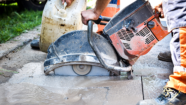 road construction site, cutting road by heavy machine